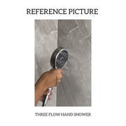 Elegant hand shower with a brushed nickel finish, installed in a luxurious bathroom 