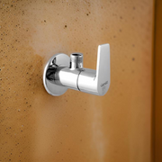 Brass angle valve with a chrome finish for plumbing applications.